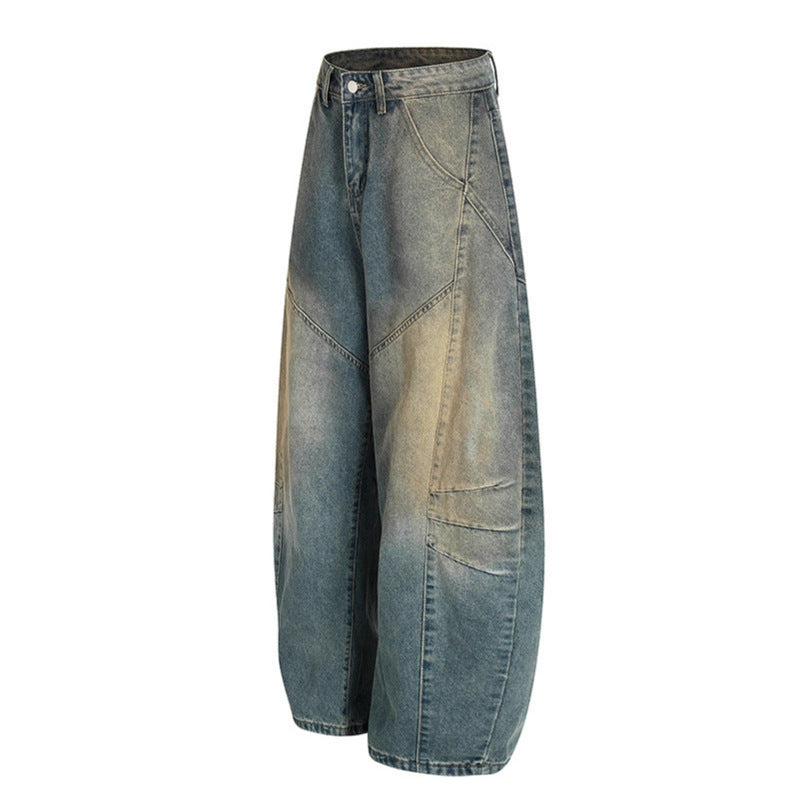 Washed denim jeans with an old silhouette and curved edges
