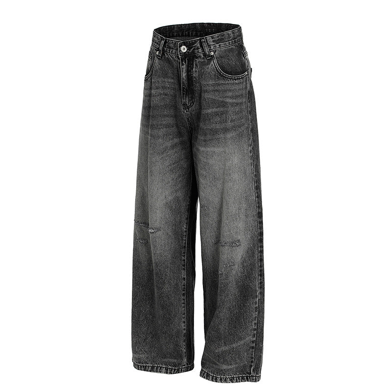 Washed and ground white distressed jeans