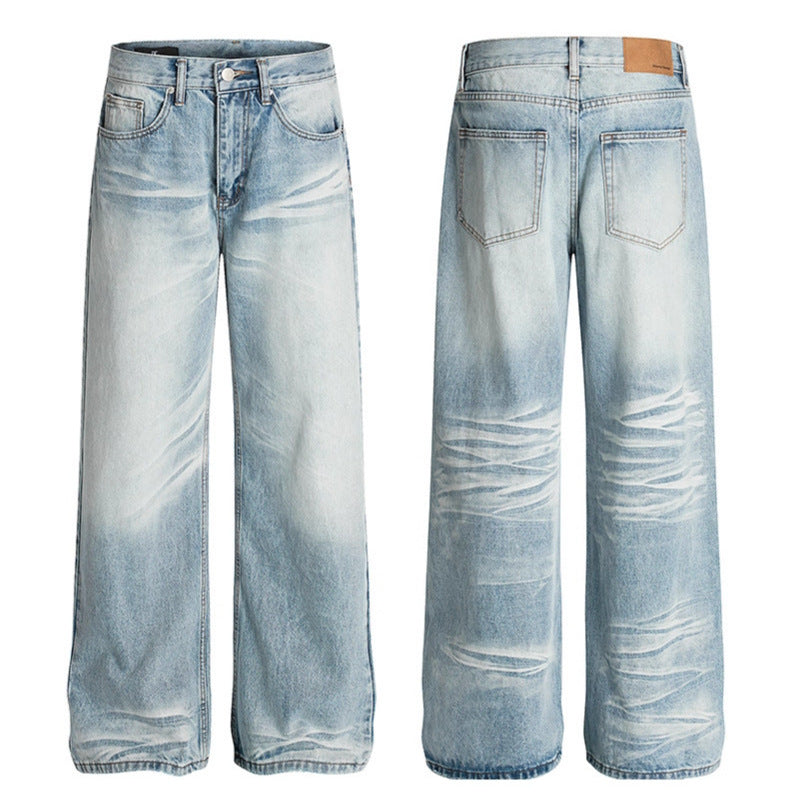 Used washed scratched and ground white straight leg jeans
