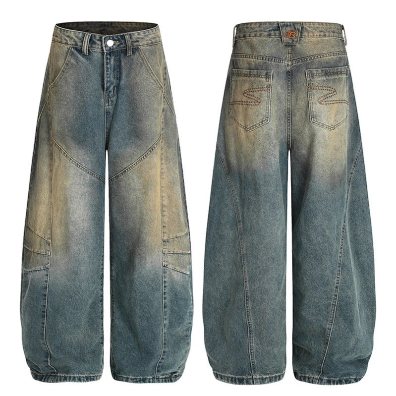 Washed denim jeans with an old silhouette and curved edges