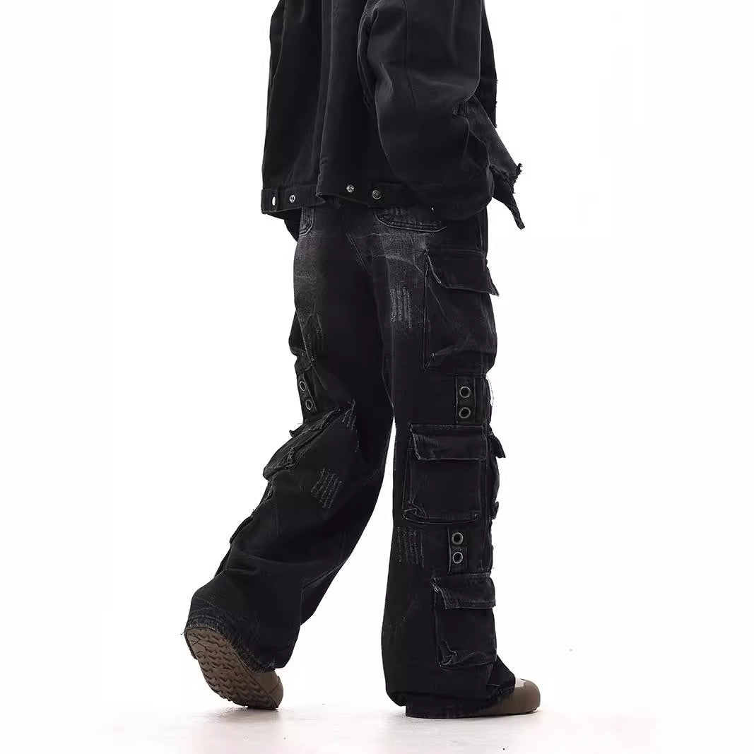 Used washed worn out metal decorated multi pocket denim work pants