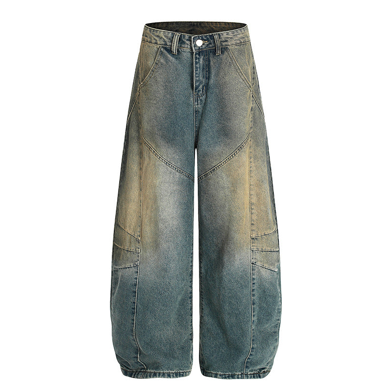 Washed denim jeans with an old silhouette and curved edges